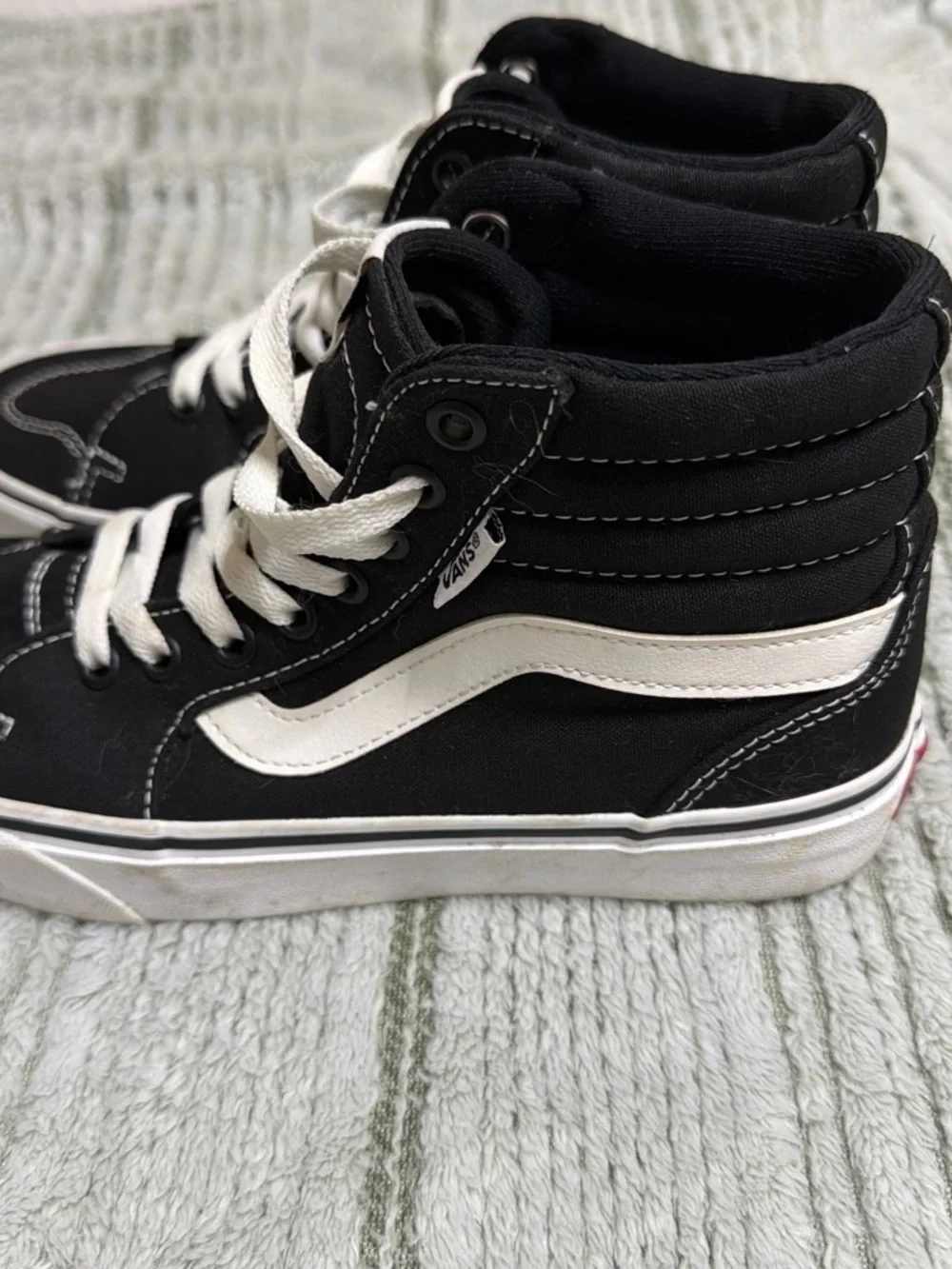 Vans Black and White High-Top Skate Sneakers
